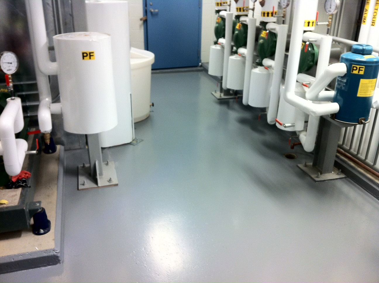 Protective flooring installed around mechanical equipment