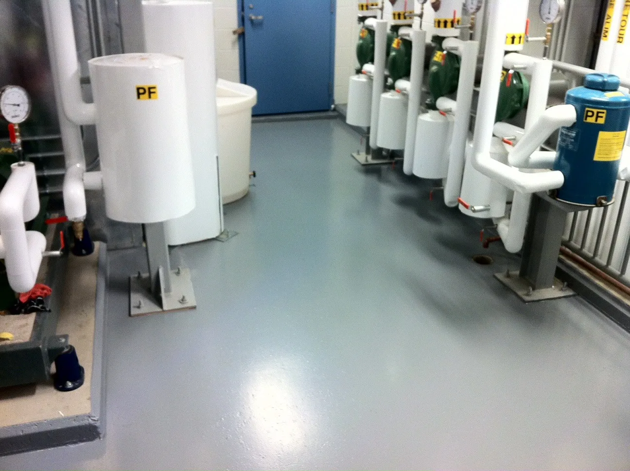 Completed waterproofing system around mechanical equipment in a federal building in Miramichi, New Brunswick